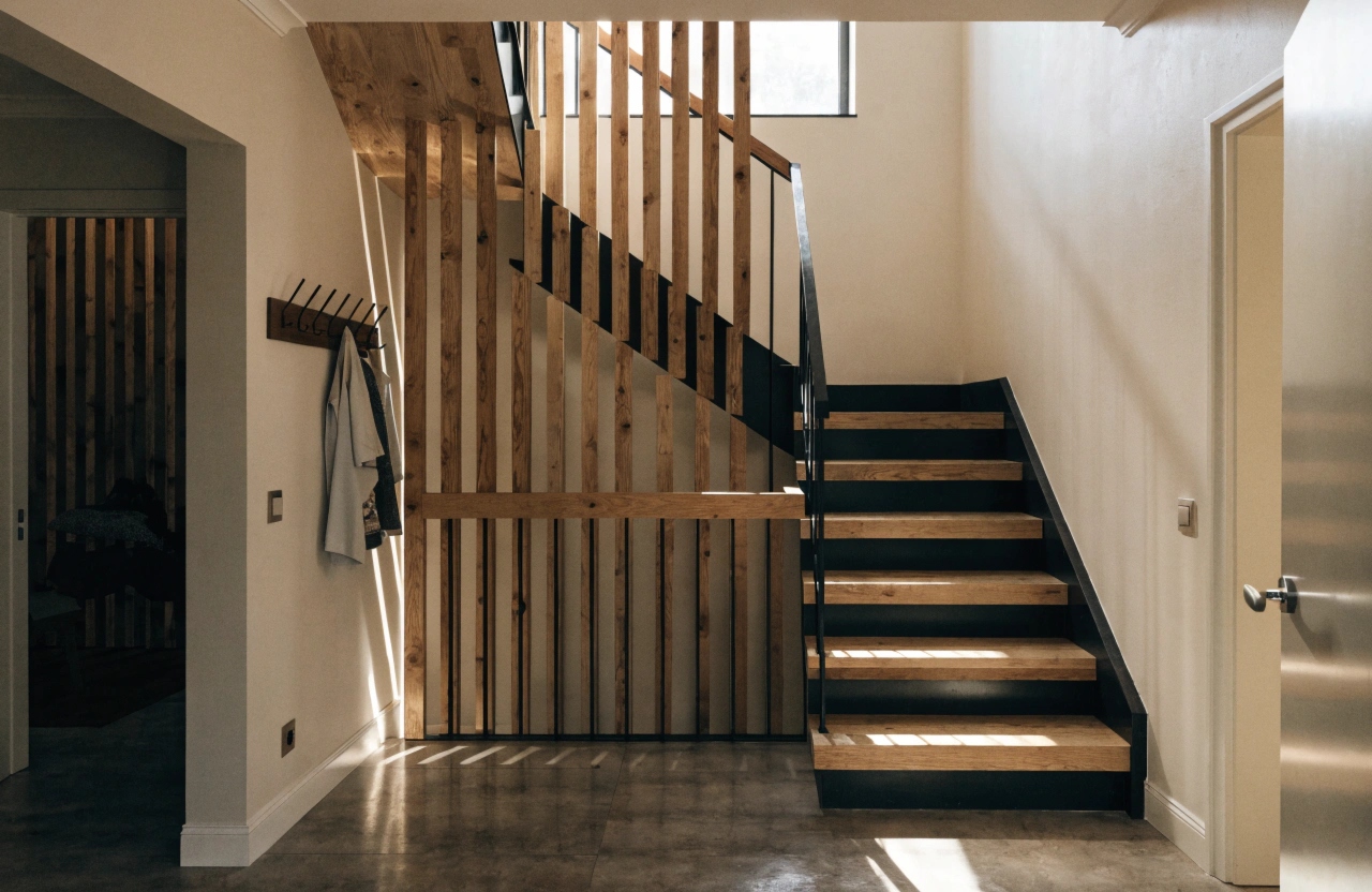 a-photorealistic-display-home-entry-featuring-a-ti Timber feature staircase joinery in a display home entry, Illawarra